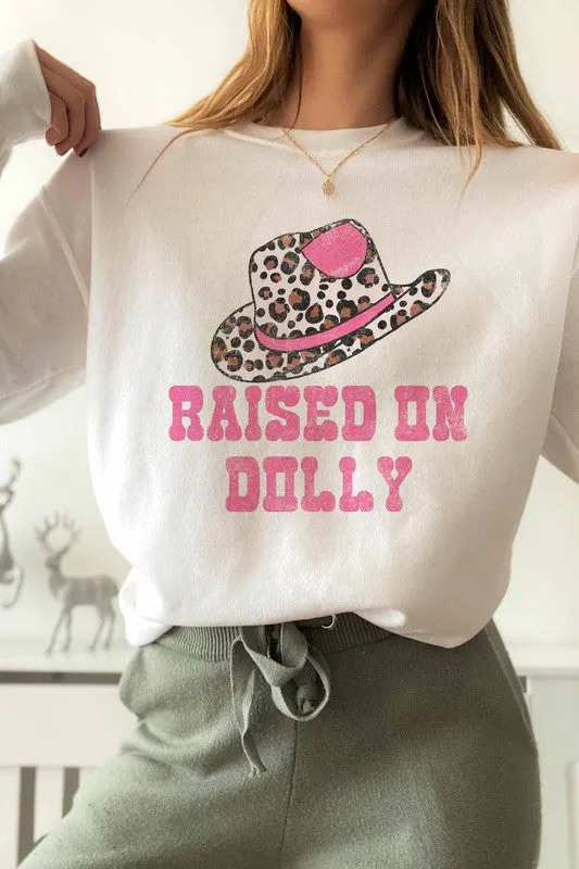 RAISED ON DOLLY GRAPHIC SWEATSHIRT
